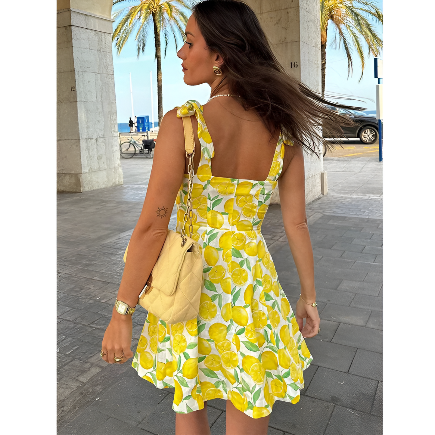 Mini sommerkjole til kvinder - Citronprint - Ærmeløs - Spaghettistropper