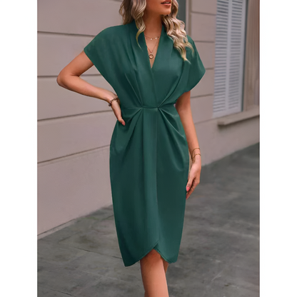 Dame wikkelkjole – elegant stil – midi-længde – sløjfe i taljen