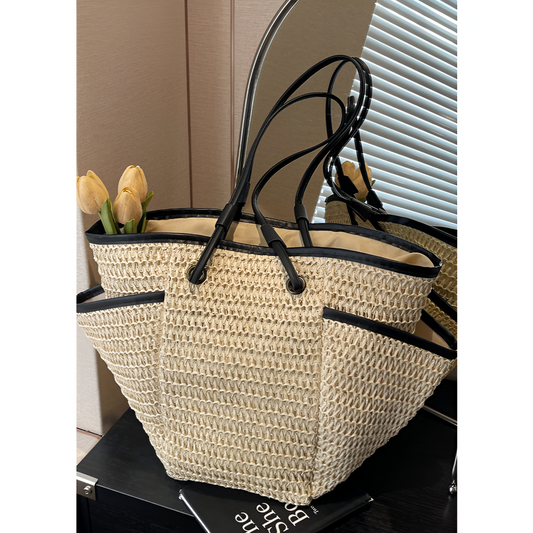 Afslappet dametaske - Vævet tekstur - Rummeligt interiør - Stilfuld finish