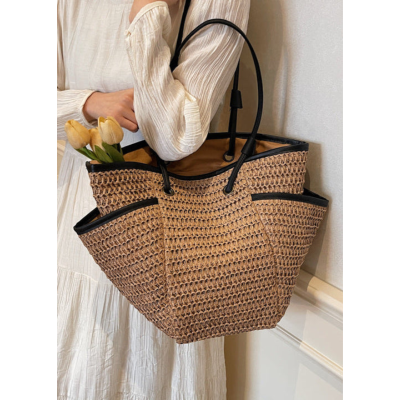 Afslappet dametaske - Vævet tekstur - Rummeligt interiør - Stilfuld finish