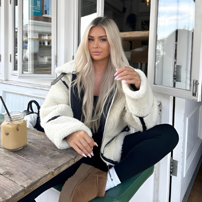 Vinterjakke til kvinder – imiteret lammeskind – oversized pasform – kontrastkant