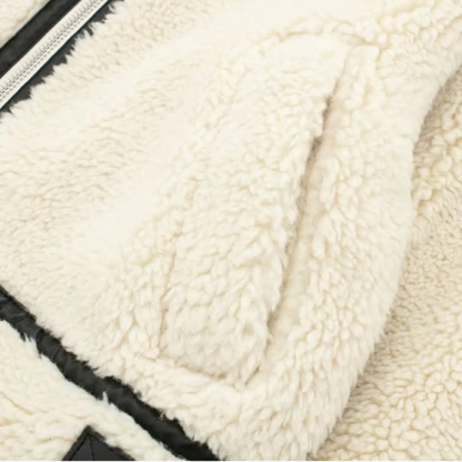 Vinterjakke til kvinder – imiteret lammeskind – oversized pasform – kontrastkant