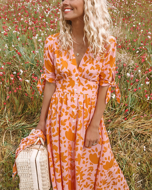 Lang Flydende Kjole - Blomsterprint & Elegante Bundet Ærmer