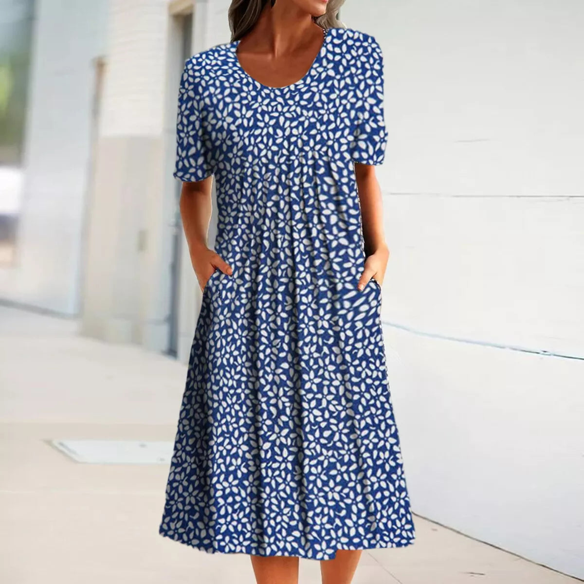 Damekjole i midi-længde – Blomsterprint – Åndbart stof – Med lommer