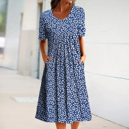 Damekjole i midi-længde – Blomsterprint – Åndbart stof – Med lommer