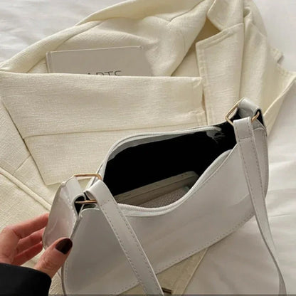 Skinnende Skuldertaske – Perfekt til Enhver Stil